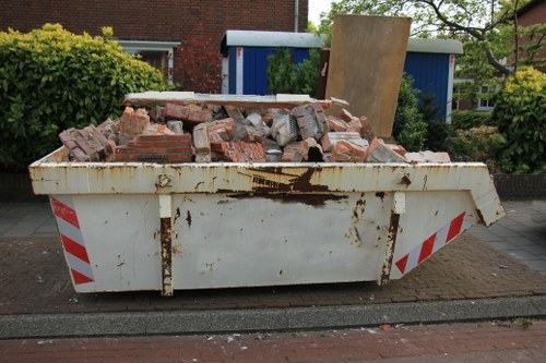 Construction site with builders waste being cleared