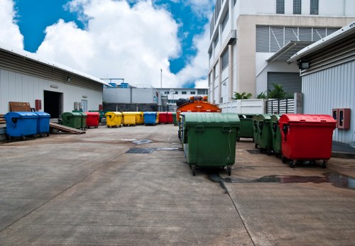 Company waste vehicle at depot for commercial collection